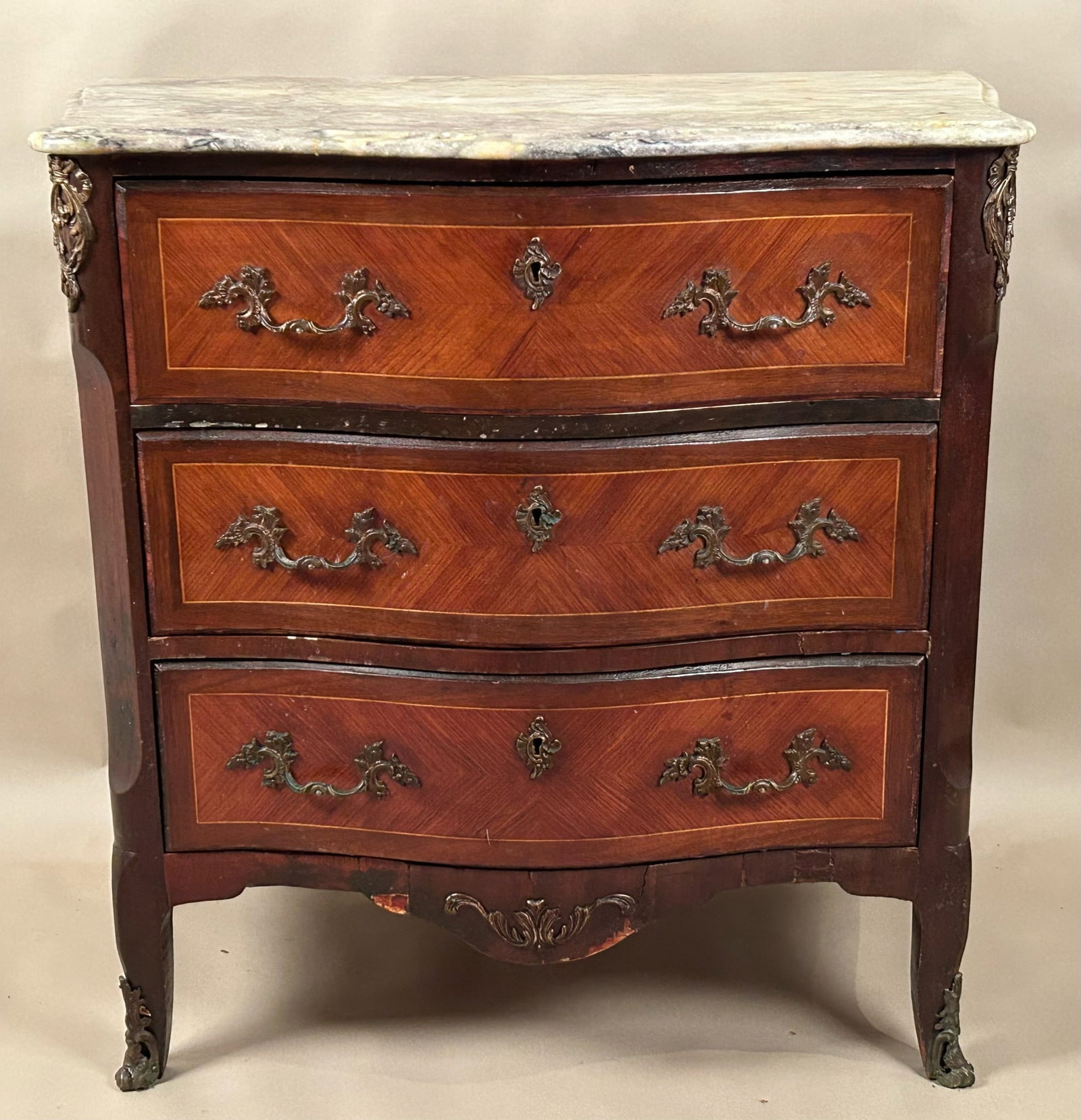 Vintage Marble Top Commode w Herringbone Inlay: Vintage marble top commode with herringbone and line inlay, original brass hardware, curved front and side. Made in Spain. 34 1/2? x 9? x 34? tall