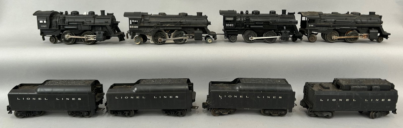 Four Lionel Locomotives with Tenders O Gauge: Four Lionel Locomotives with Tenders. Numbers 1001, 8040, 1061 and 246. O Gauge