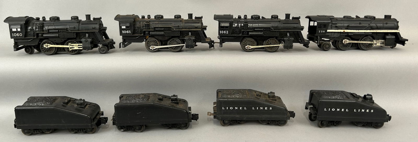 Four Lionel Locomotives with Tenders O Gauge: Four Lionel Locomotives with Tenders. Numbers 1060, 1061, 1062 and 238. O Gauge