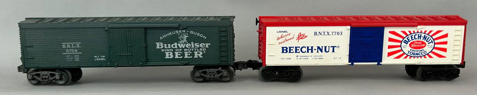 Two Lionel Boxcars O Gauge: Lionel 7703 Beechnut Tobacco Railroad Boxcar and 5704 Budweiser Reefer Boxcar. O Gauge
