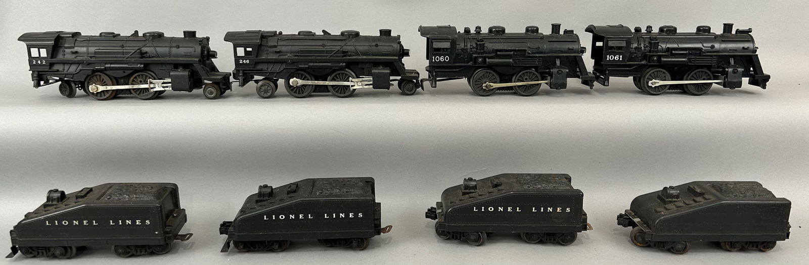 Four Lionel Locomotives with Tenders: Four Lionel Locomotives with Tenders. Numbers 242, 246, 1060 and 1061