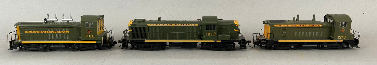 HO scale three Canadian national diesel locomotives: HO scale three Canadian national diesel locomotives, 7018, 1373, 1812.