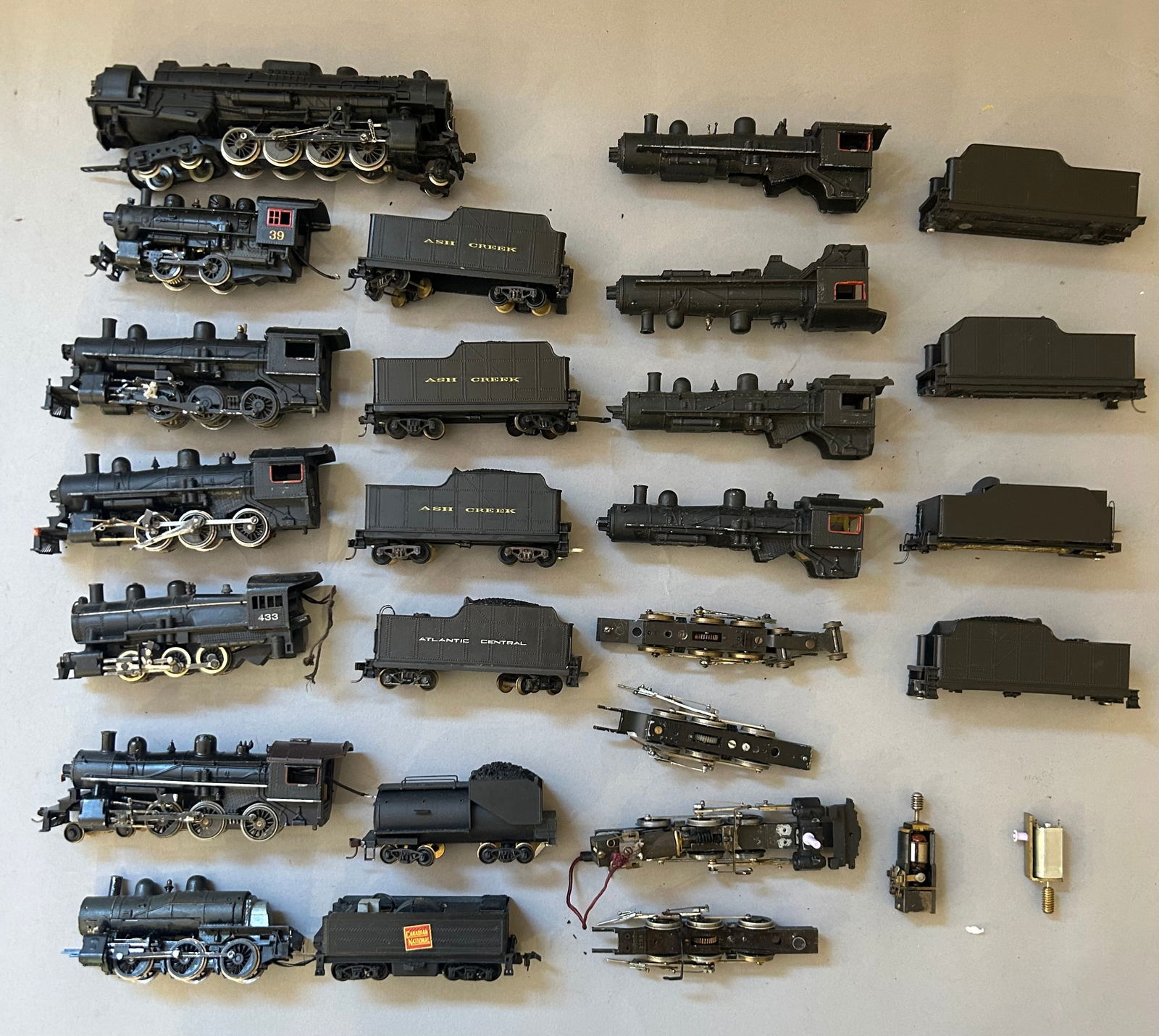 Large lot of HO scale steam engines with coal cars (1 of 7)