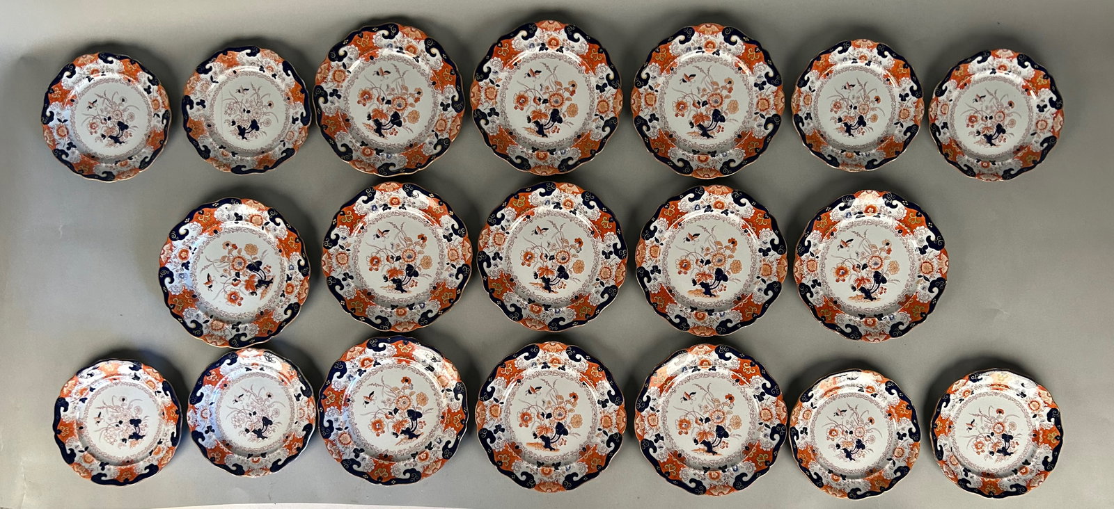 19 pieces Imari ironstone China: 19 pieces Imari ironstone China 11 9 inch plates and 88 inch plates. Walmart with English lion unicorn and crown on reverse. Repair to 18 inch plate. Age appropriate wear.