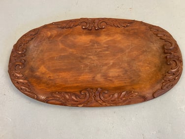 Carved wooden plate