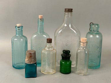 8 Antique Advertising Bottles w Impressed Inscriptions