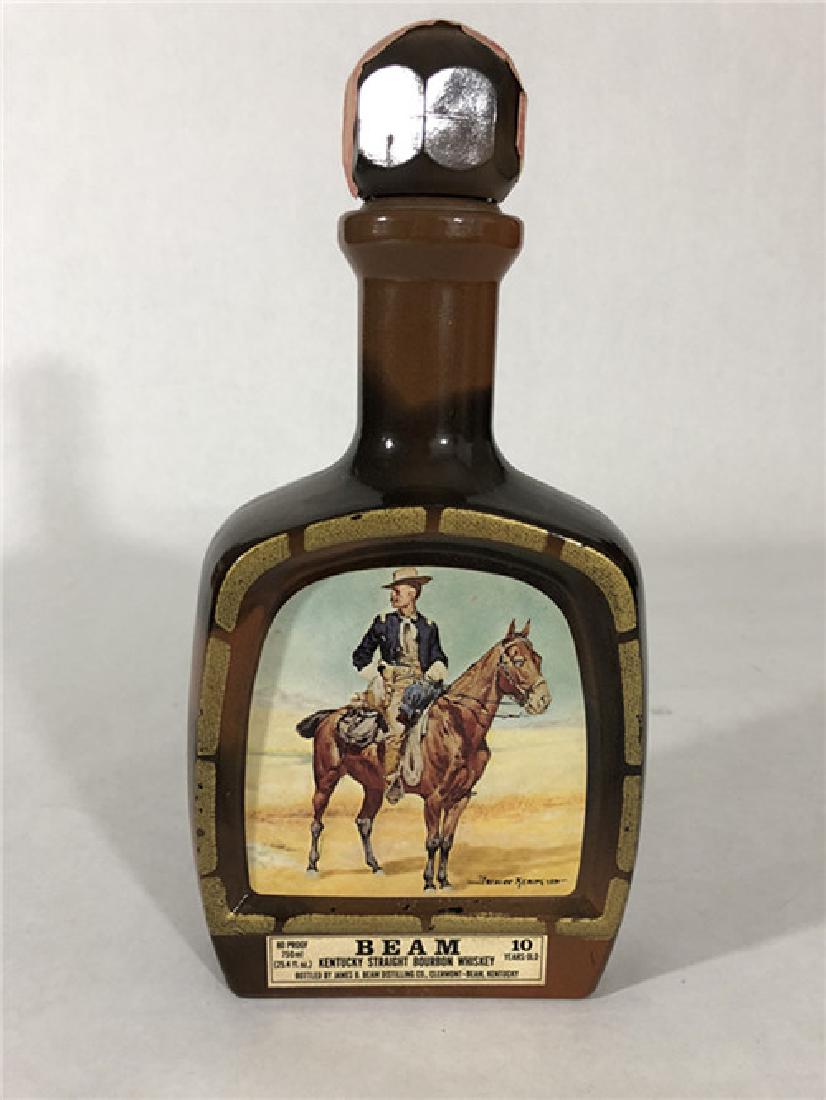 Vintage Jim Beam Decanter Bottle with Frederic: Vintage Jim Beam Decanter Bottle with Frederic Remington Art Western Americana.The Bottle Measures Approx 10 5/8 Inch Tall,5 1/4 Inch Wide,2 Inch Deep Notice to bidders: Please carefully read the auct