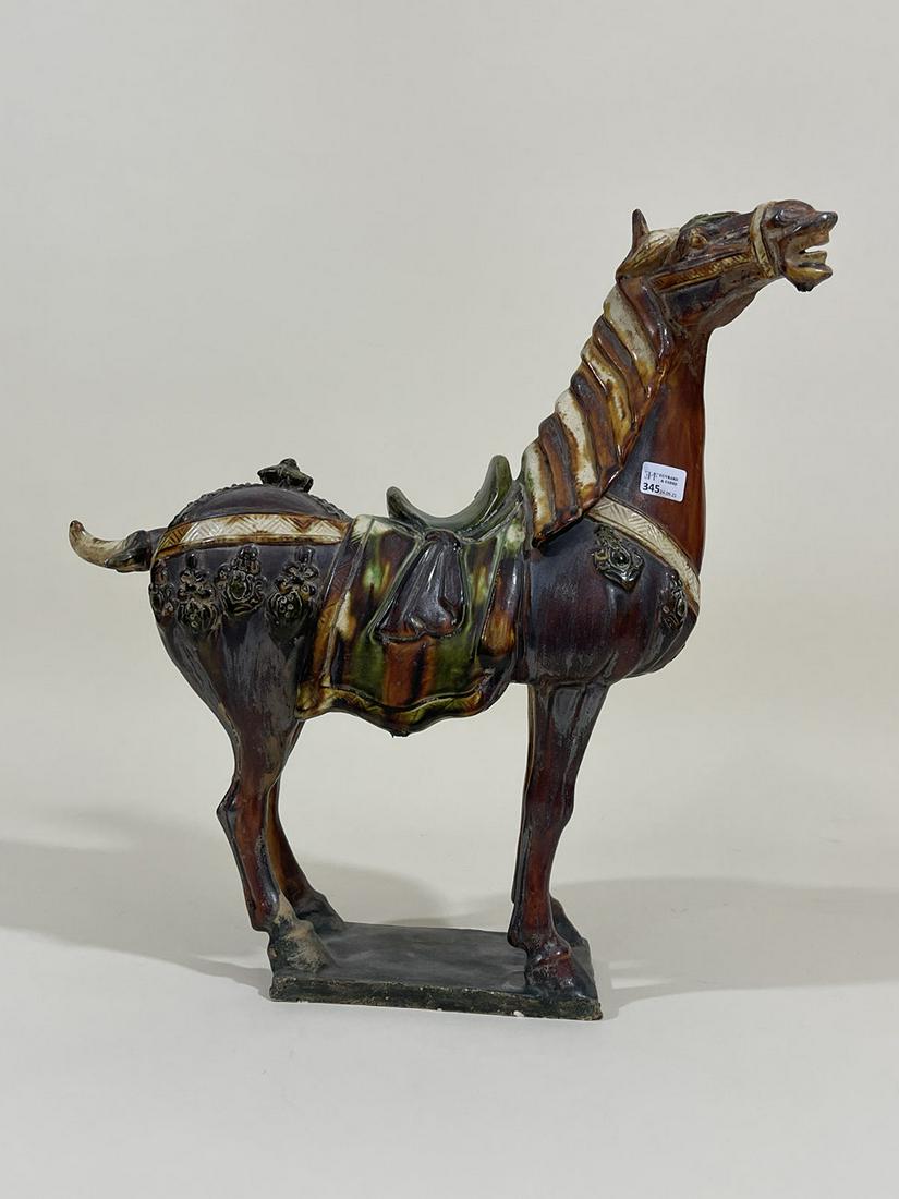 Ming Dynasty Tang Sancai sweat blood horse: Ming Dynasty Tang Sancai sweat blood horse left ear damage dimensions height 41 cm long 42 cm. Note to Bidders: Please read Solidity's Auction Terms carefully before bidding. All items have been used 