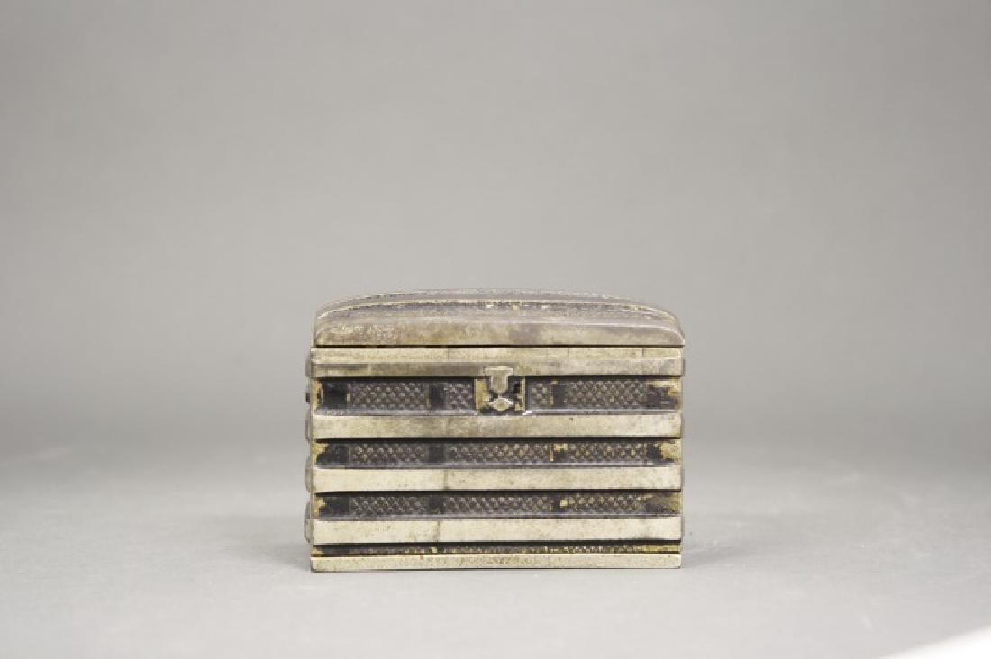 Trunk: Made by Piaget. Cast Iron. 2 1/2" H x 3 1/2" L. Very Fine Condition.