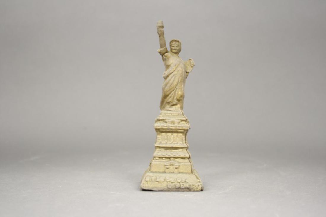 Statue of Liberty, Small: Made by A. C. Williams. Cast Iron. 6 1/16" H. Very Good Condition.