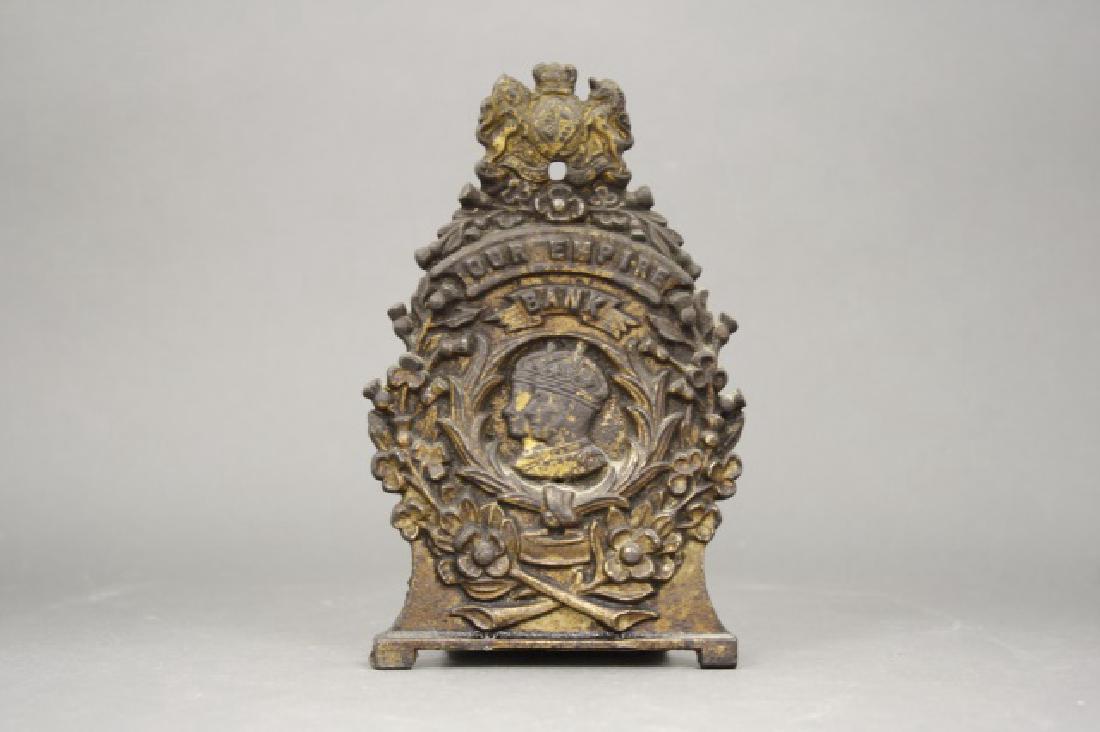 Our Empire Bank: Made in England. Cast Iron. 6 1/2" H. Very Good Condition.