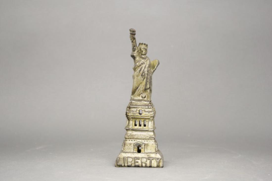 Statue of Liberty, Medium (Silver): Made by A. C. Williams. Cast Iron. 6 1/4" H. Very Good Condition.