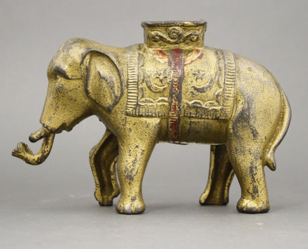Elephant Swings Trunk, Large: Made by A. C. Williams of Ohio circa 1900s. Cast Iron. Fine Condition.