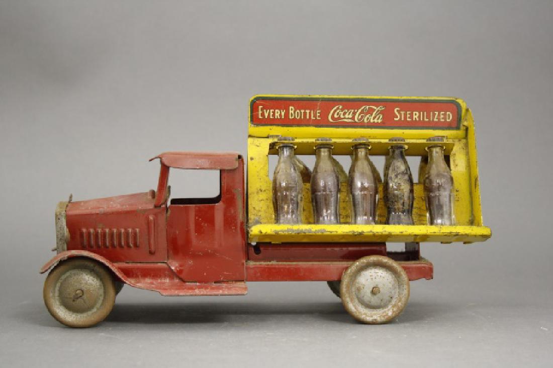 Coca Cola Truck: Made by Metalcraft Corp circa 1935. Sheet Steel and Glass Bottles. 11" Long. Very Good Condition.