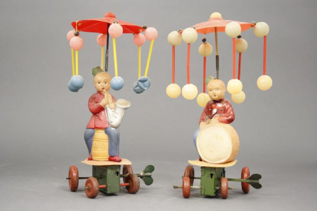 Lot: Boy Playing Sax, Boy Playing Drum (1 of 2)