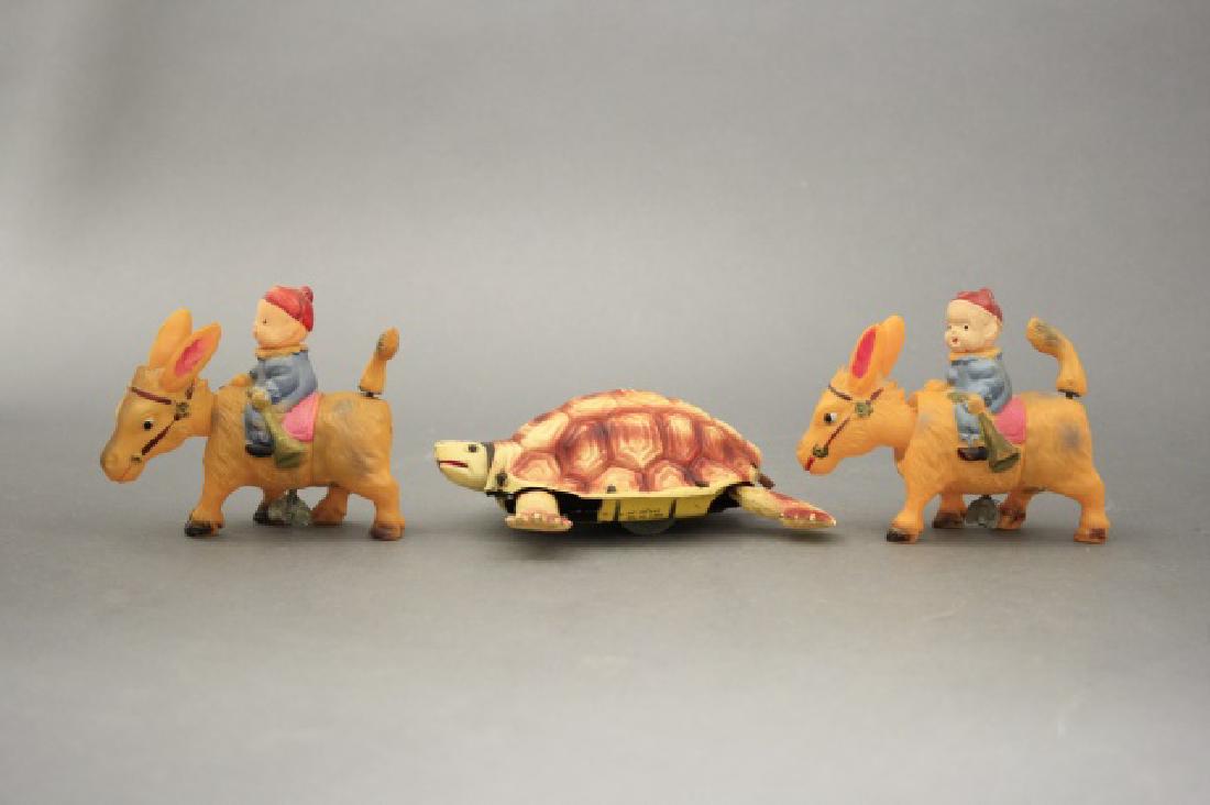 Lot: Two Donkeys with Rider, One Turtle (1 of 2)