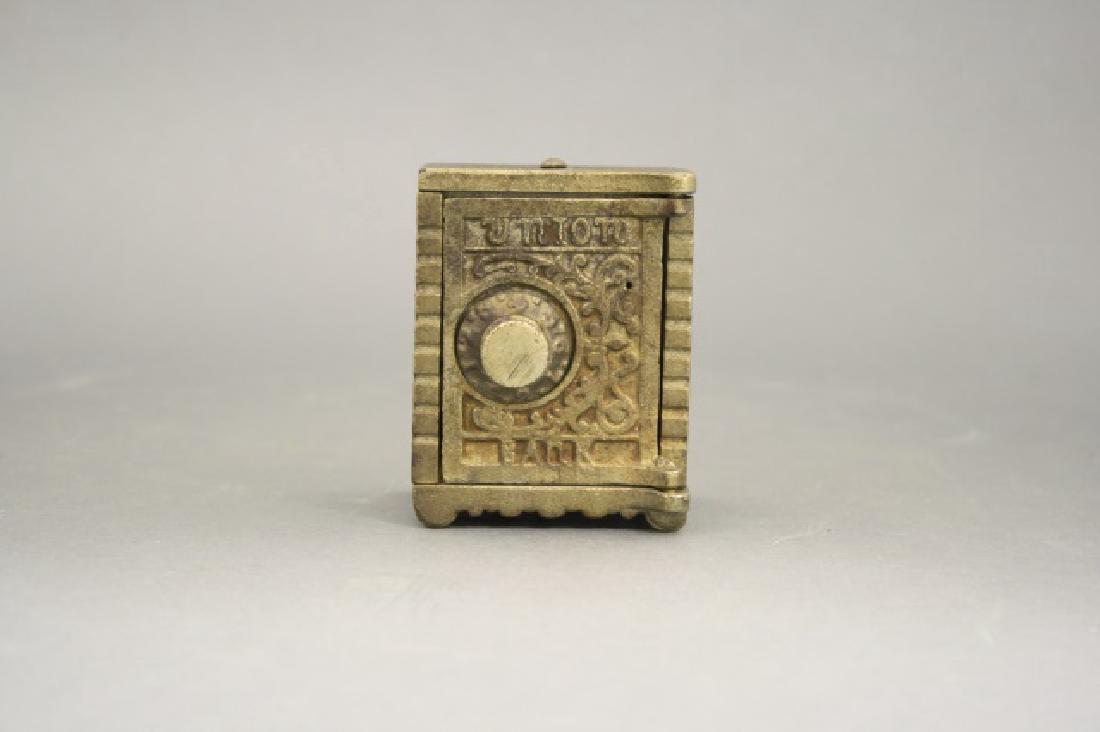 Union Bank: Made by Kenton Hardware circa 1895. Cast Iron and Tin. 3.25" H. Fine Condition