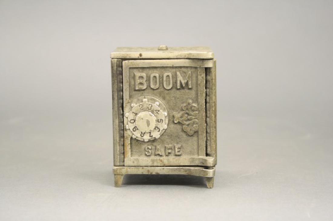 "Boom" Safe: Made by Kenton Hardware circa 1890's. Cast Iron and Tin. 3 1/4" H. Fine Condition.