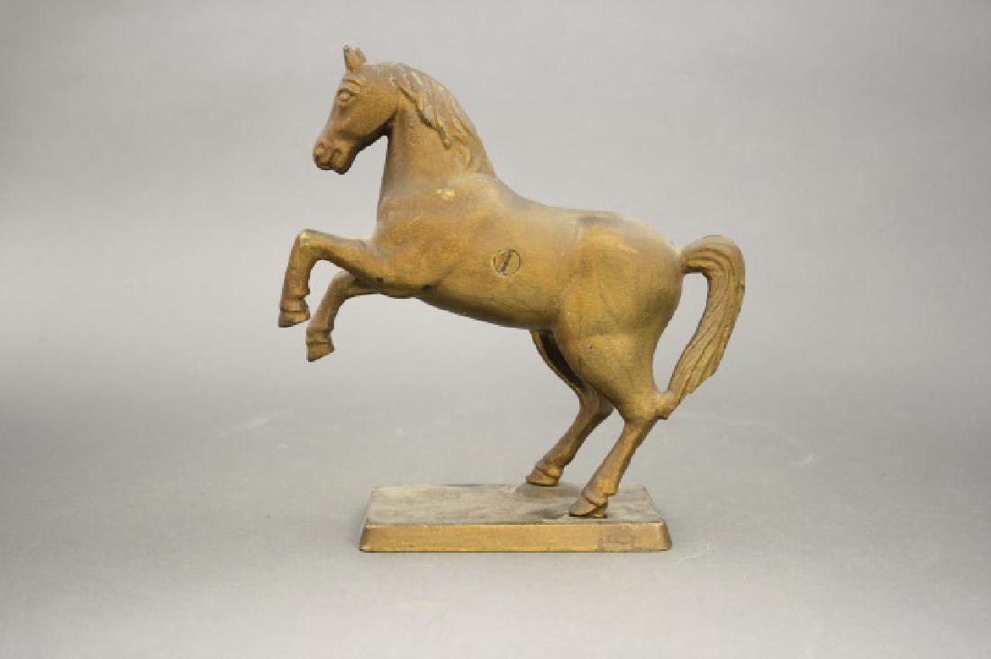 Rearing Horse on Base: Made by A. C. Williams circa 1920s 7 1/2" H. Cast Iron. Fine Condition.