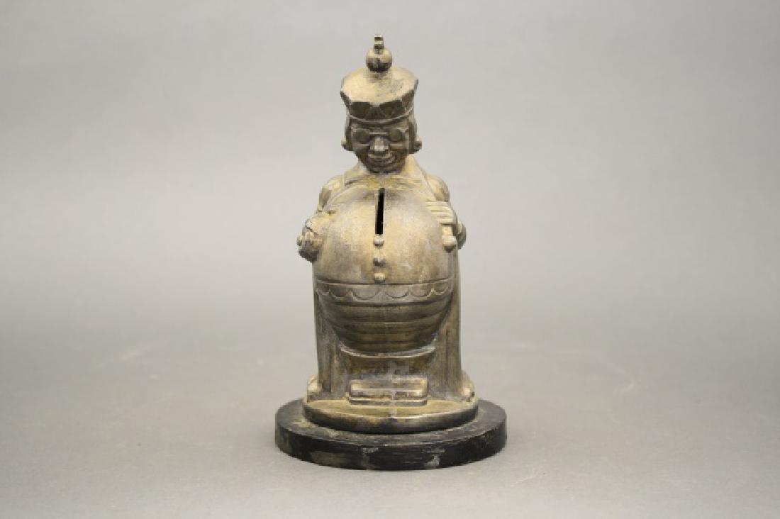 The Belly King: Made in Europe circa 1930's. Spelter with Wood Base. 7" H. Fine Condition.