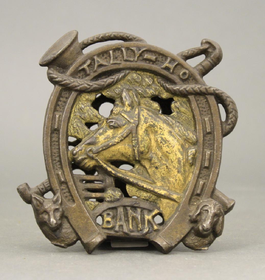 Tally-Ho: Made by Chamberlain & Hill of England. Cast Iron. 4 1/2" H. Very Good Condition.