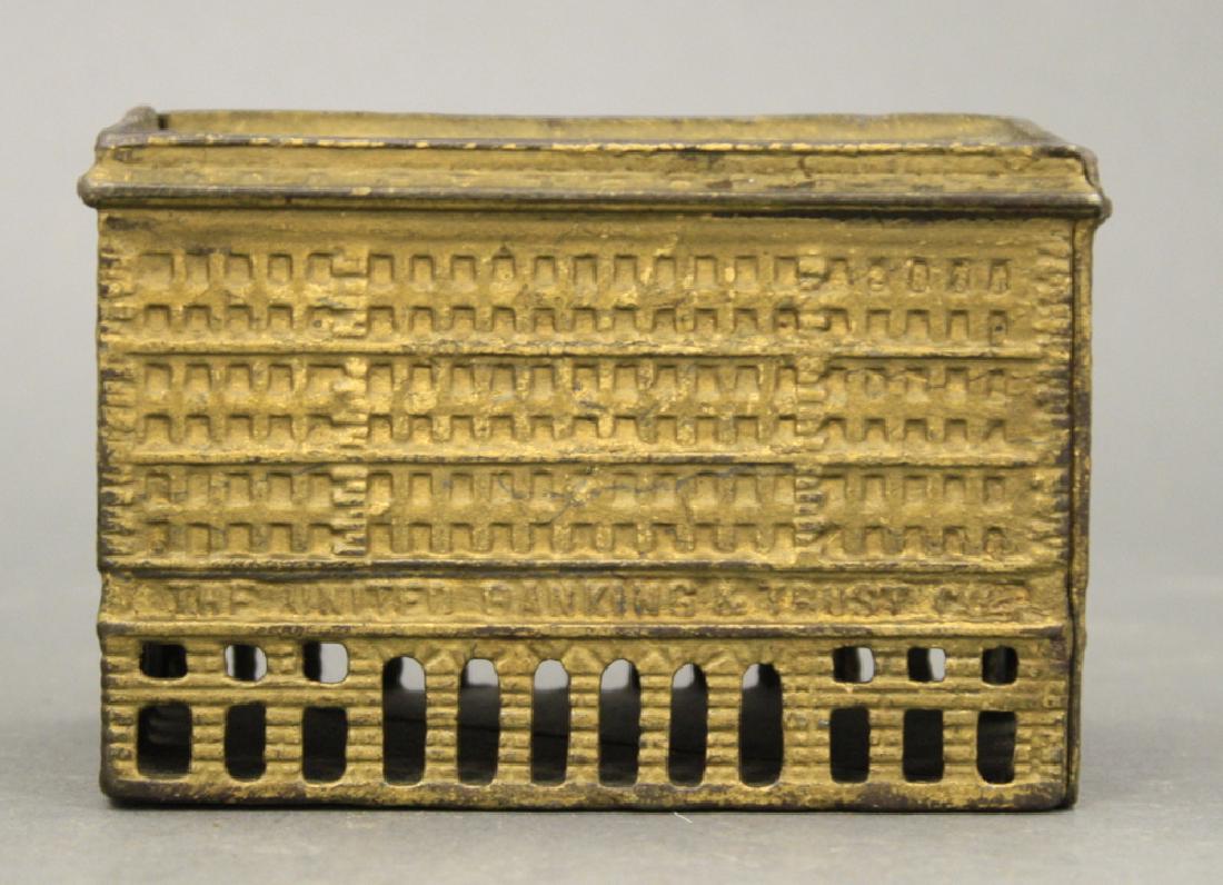 United Bank: Made by A. C. Williams circa 1900's. Cast Iron. 5 1/4" H. Very Fine Condition.