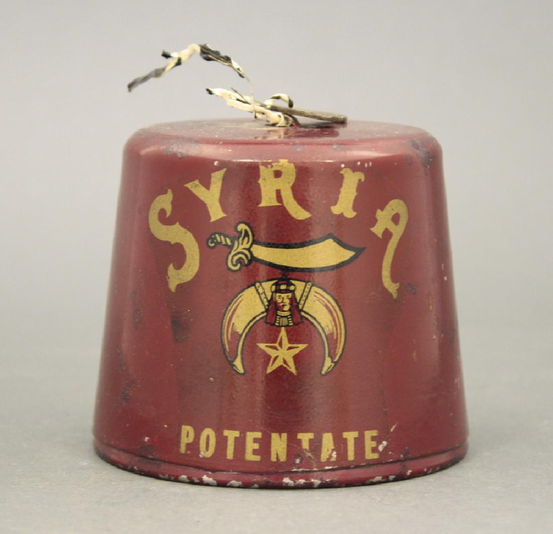 Syria Fez: Made in America dated 1963. Steel. 3" H. Very Fine Condition.