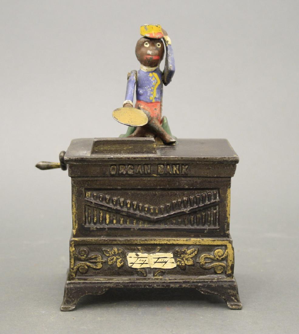 Organ, Medium: Made by Kyser & Rex circa 1880's. Cast Iron. Excellent Paint (Hat with Arm not functioning properly).