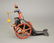 Clown Riding a Whale's Back Bell Toy