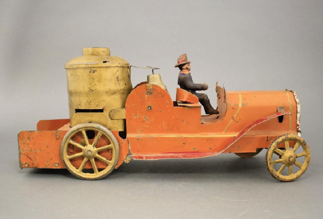 Fire Pumper Friction Toy: Dayton Hillclimber circa 1912. Tin and Cast Iron. 14 1/2" L. Very Fine and Works Well (Missing the steering wheel).