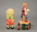 Lot: Crying Child / Sax Player