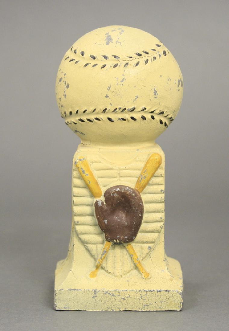 Baseball Trophy Bank: Made of White Metal. 6" H. Fine Paint Condition. Some cracks around base and right below baseball.
