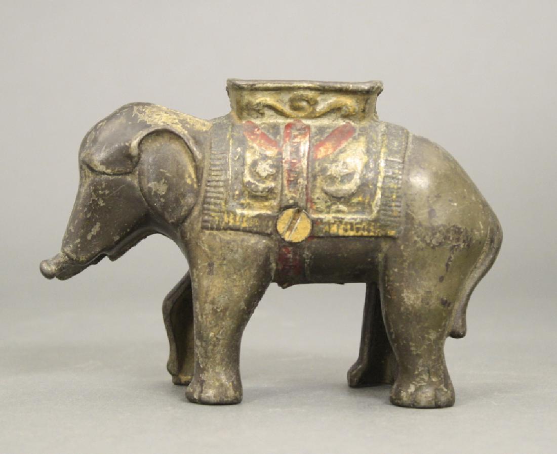 Elephant Swivel Trunk: Made of Cast Iron. Good Paint Condition (Trunk is Missing).