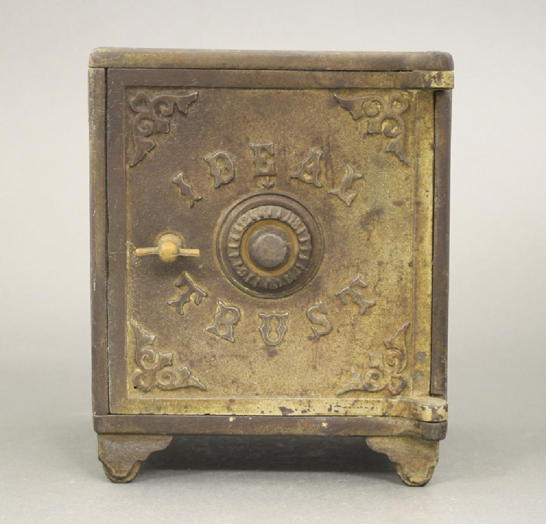 Ideal Trust Safe: Made of Cast Iron. 7 1/8" H. Good Condition.