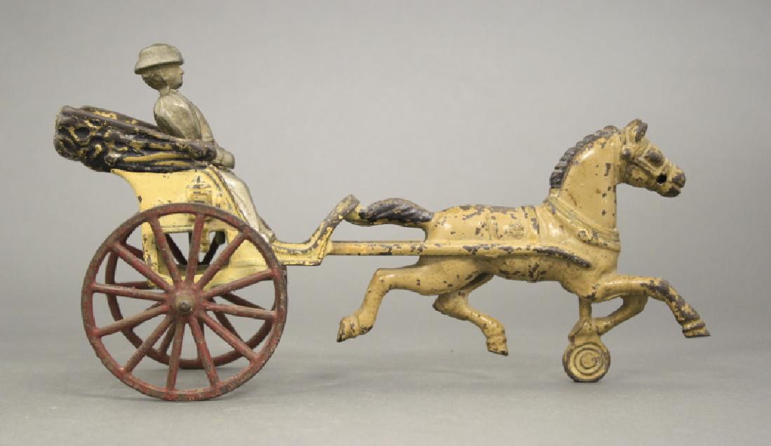 Hubley Gig: Made of Cast Iron. 9 1/2" L. Fine Condition.