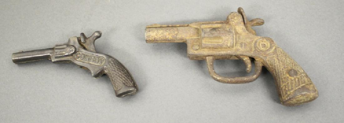 Lot: Cowboy and Buddy Cap Guns: Made of Cast Iron. 3 1/2" to 4 1/2" L. Very Good to Fine Condition.