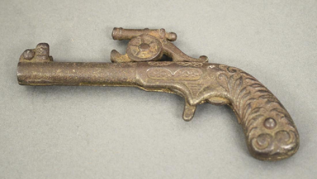 Cannon Articulated Cap Gun: Made of Cast Iron. 5" L. Very Good Condition.