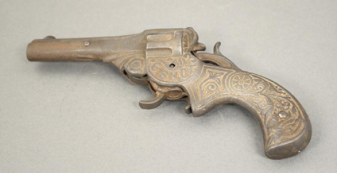Six Shot Cap Gun: Made of Cast Iron. 7" L. Good Condition.