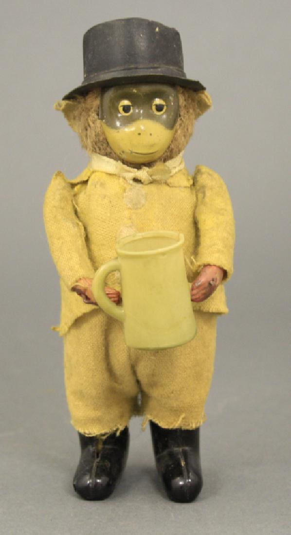 Monkey with a Pint Windup Toy (1 of 2)