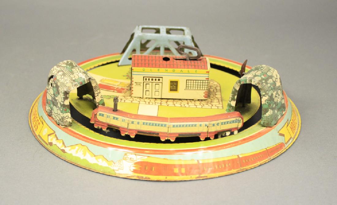 Honeymoon Express: Made of Tin. In Fine Condition (Works Sporadically).