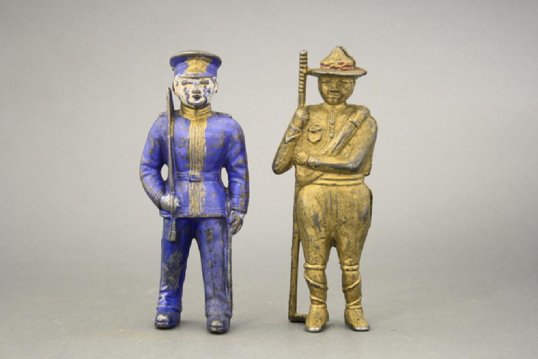 Lot: Two Figural Cast Iron Still Banks (1 of 2)