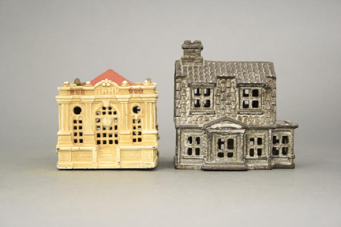 Lot: Two Cast Iron Still Building Banks (1 of 2)