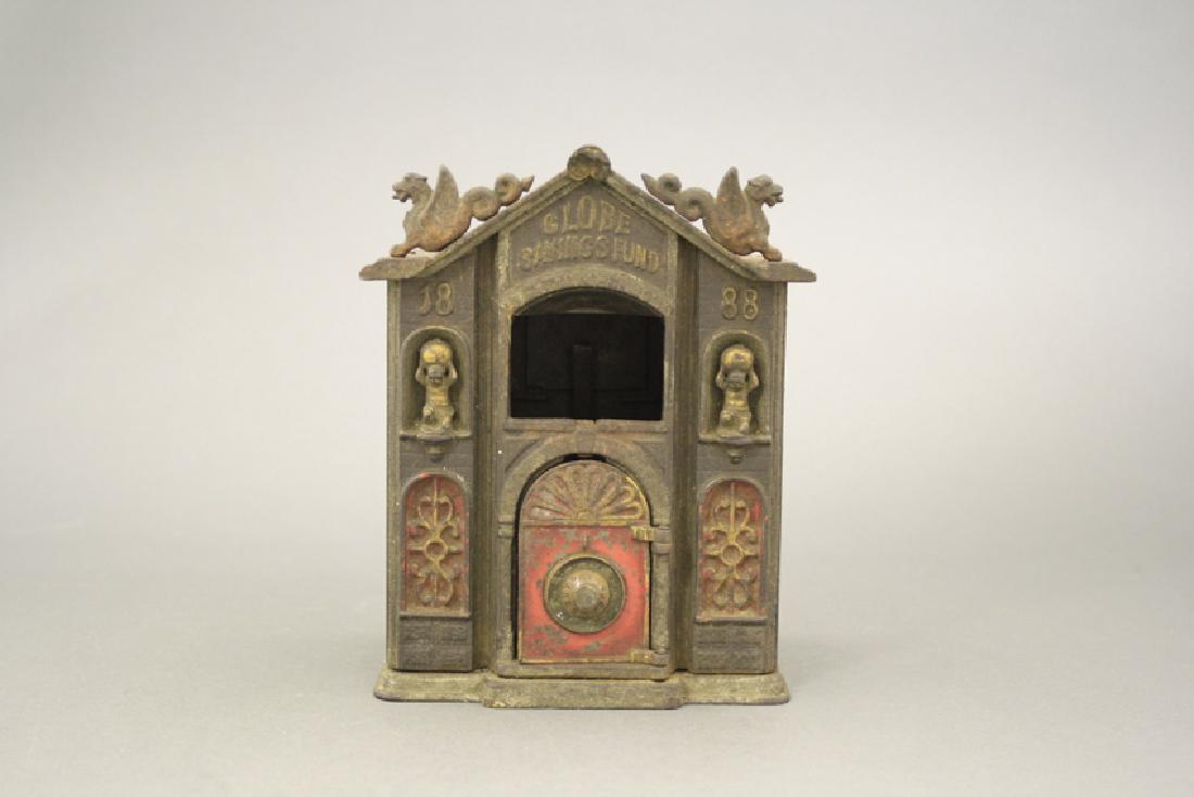 Globe Savings Fund Bank: Kyser & Rex. Made of Cast Iron. Overall in Good Paint Condition (Corner Broken, Drawer Missing).