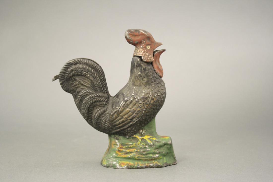 Rooster Bank: Kyser & Rex. Made of Cast Iron. In Excellent Condition.