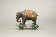 Elephant with Tusks on Wheels Bank