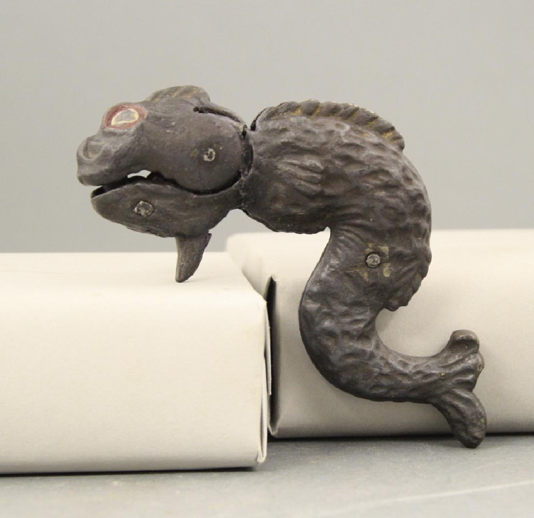 Serpent Cap Gun: J. & E. Stevens. Made of Cast Iron. American - Circa 1895. 4.5" L. Very Good Condition (Works Slowly).