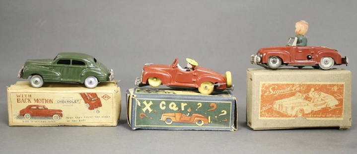 Three Windup Cars: Occupied Japan circa 1940's. Made of Tin. Work Well. Excellent to Pristine Condition with Boxes.