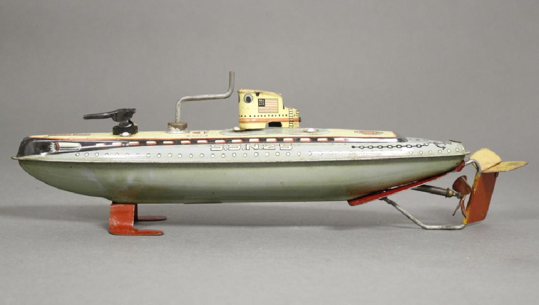 Submarine "SSN 25": Made by Marusan Toys. Japan circa 1950. Made of Tin. 10" Long. The gyroscopic mechanism works well. Very Fine (The bridge is loose).