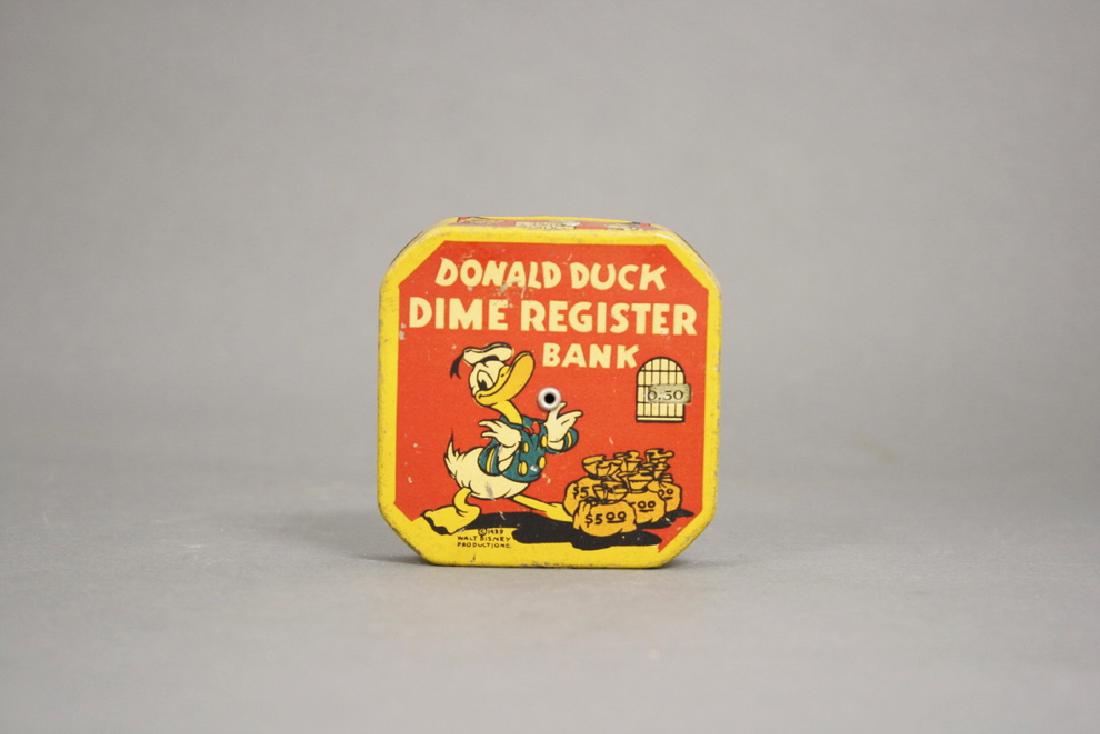 Donald Duck Dime Register: Walt Disney Productions. American - Circa 1939. Made of Tin. Excellent Condition.