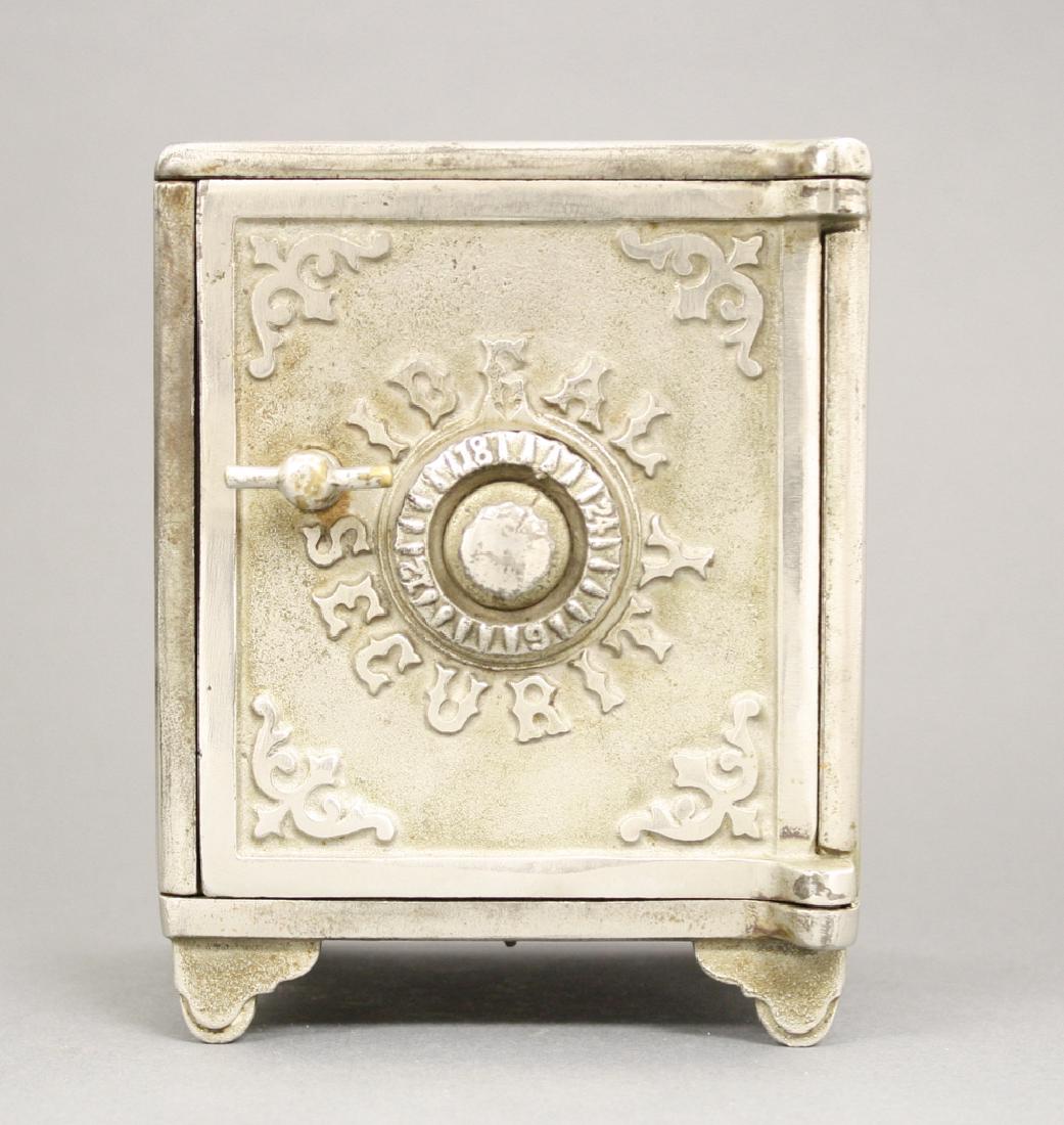 Ideal Security Bank: American - Circa 1895. 5.5" H. Made of Cast Iron. Very Fine Condition.
